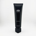 Single black tube of S1N Care fragrance-free body lotion, 6.8 fl oz/200 ml, on white background